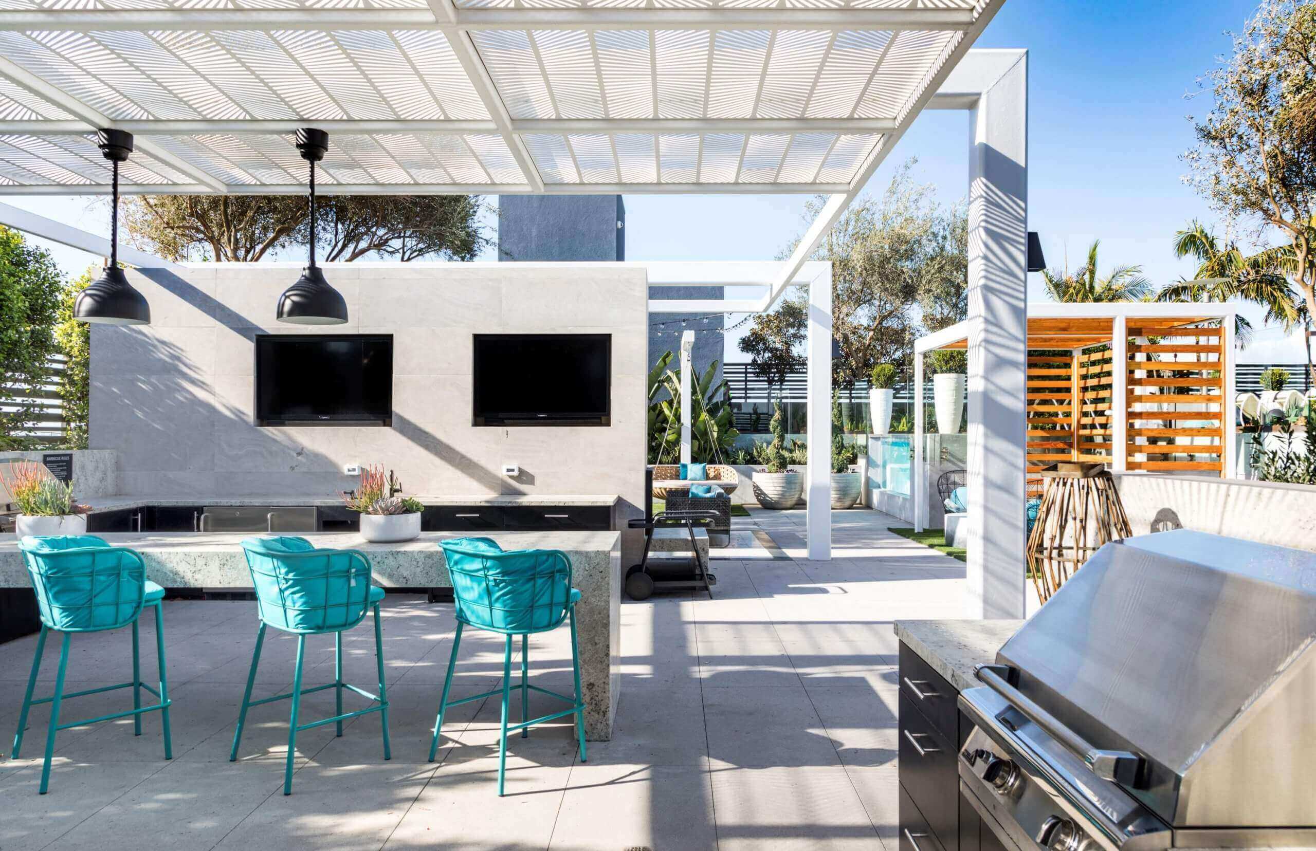 rooftop kitchen and bar at sunset at broadstone arden apartments near costa mesa