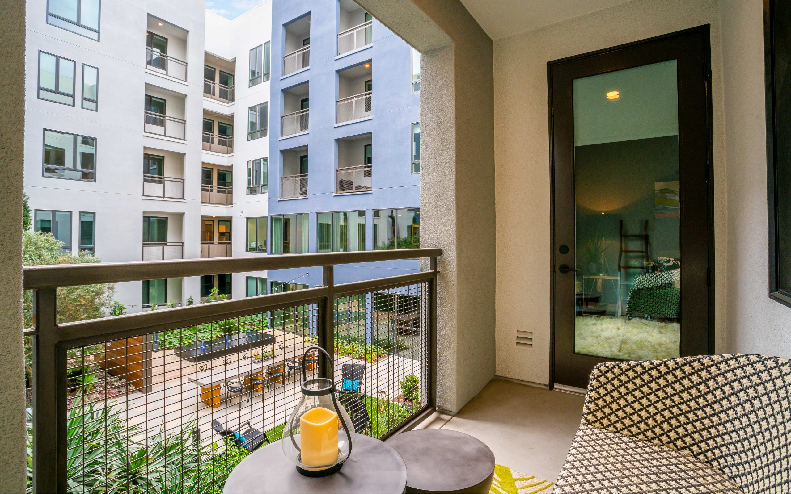 spacious balcony with courtyard view at broadstone arden apartments near tustin